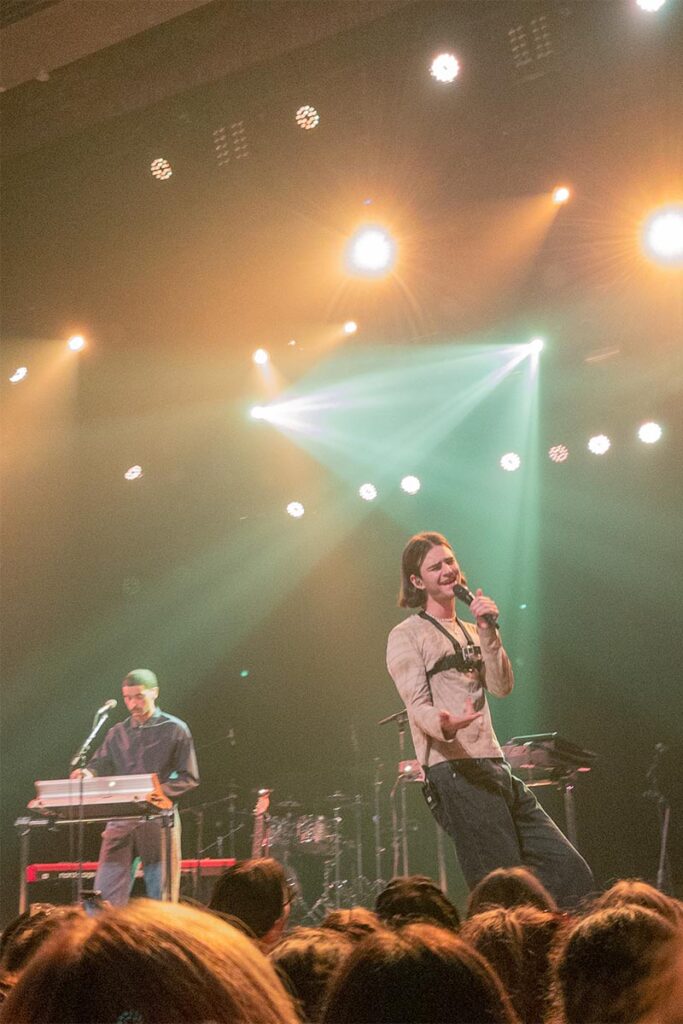 A full-colour image of Ruby Red performing at the Theatre Corona in Montreal